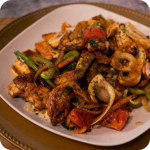 Chicken Teriyaki glazed with savory teriyaki sauce and served fresh at Fire & Feast in Commerce Township, Michigan.