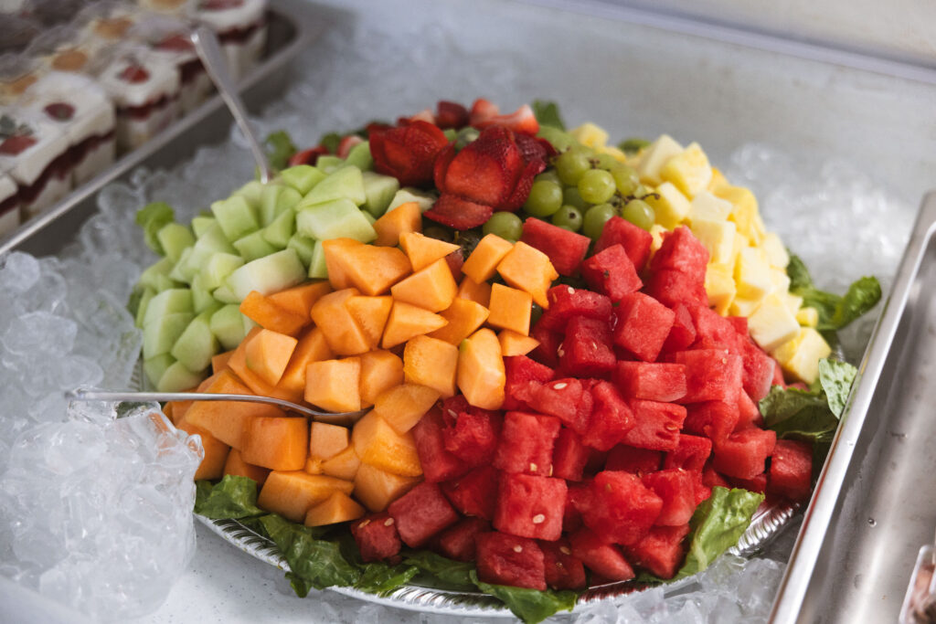 Fire & Feast Fresh Fruit Display featuring a colorful assortment of seasonal fruit prepared for catering in Commerce Township, Michigan.